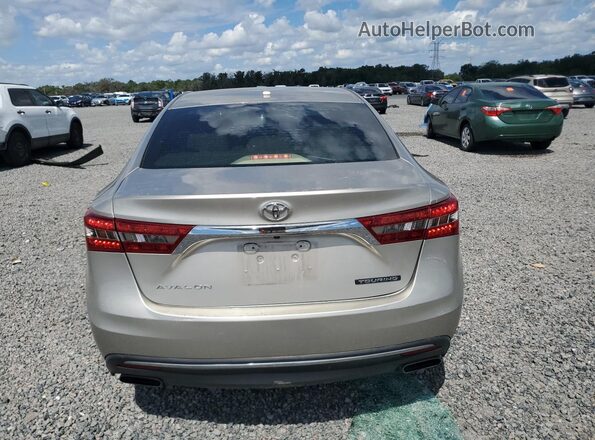 4T1BK1EB3HU242977 2017 TOYOTA AVALON Gold Հետևի տեսք