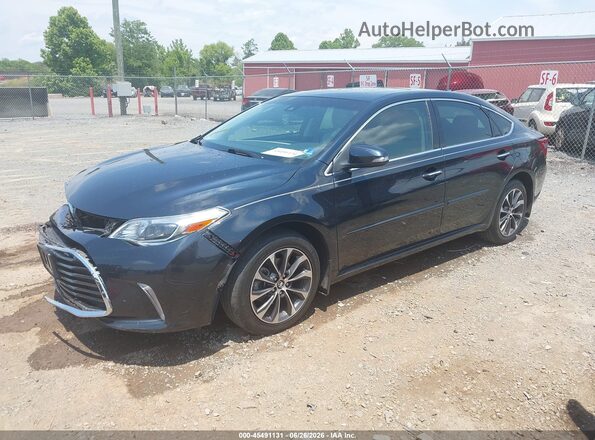 4T1BK1EB4JU281941 2018 TOYOTA AVALON Blue Vista tres cuartos delantera izquierda