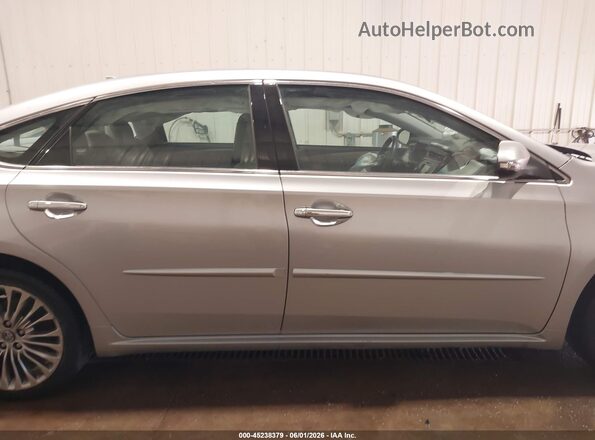 4T1BK1EB6JU269922 2018 TOYOTA AVALON Silver უკანა სალონის ხედი