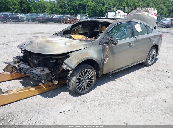 4T1BK1EB7GU223475 2016 TOYOTA AVALON Gold Առջևի ձախ երեք քառորդ տեսարան