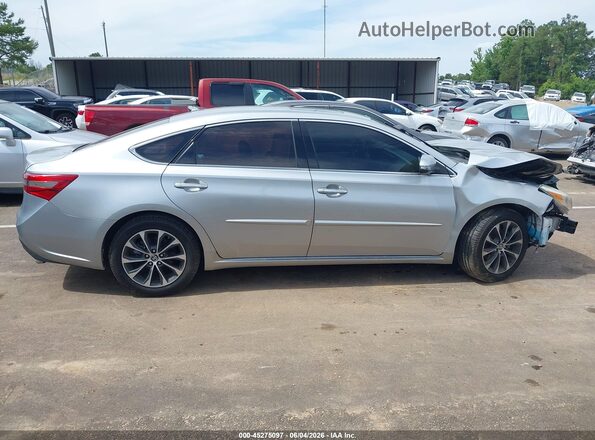 4T1BK1EB8GU203803 2016 TOYOTA AVALON Silver Rear interior view