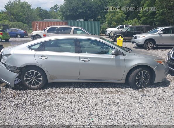 4T1BK1EB9GU219461 2016 TOYOTA AVALON Silver Widok wnętrza z tyłu