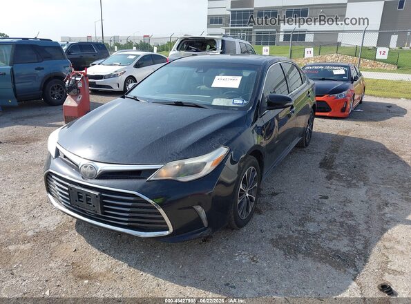 4T1BK1EB9JU288836 2018 TOYOTA AVALON Black Front left