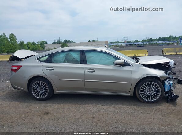 4T1BK1EBXGU226273 2016 TOYOTA AVALON Tan Widok wnętrza z tyłu