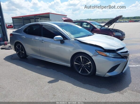 4T1BZ1HK5KU025350 2019 TOYOTA CAMRY Silver Widok wnętrza z tyłu