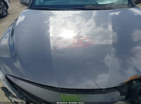4T1C11AK7RU856879 2024 TOYOTA CAMRY Gray Rear view
