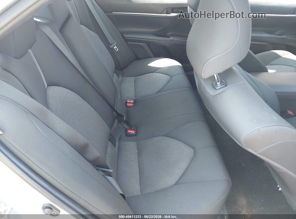 4T1C11BK5MU021046 2021 TOYOTA CAMRY Silver VIN sticker view