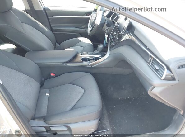 4T1C11BK5MU021046 2021 TOYOTA CAMRY Silver Front interior view