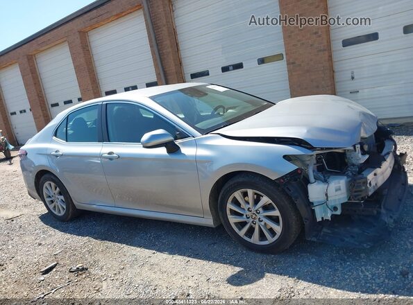 4T1C11BK5MU021046 2021 TOYOTA CAMRY Silver Rear interior view