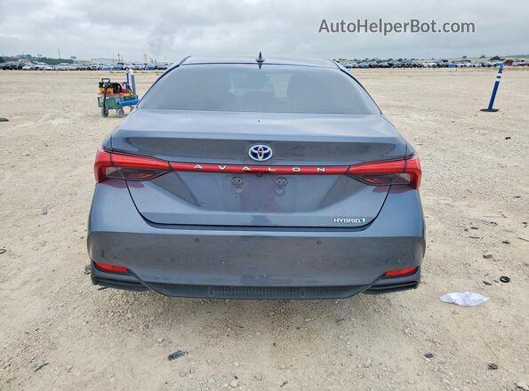 4T1DA1AB0NU012892 2022 TOYOTA AVALON Blue Հետևի տեսք