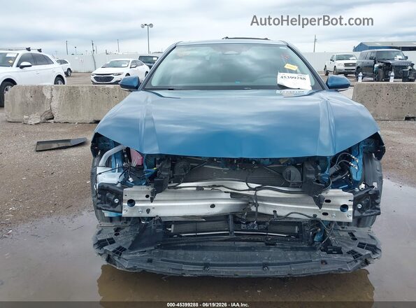 4T1DAACK0SU615303 2025 TOYOTA CAMRY Blue Rear interior view
