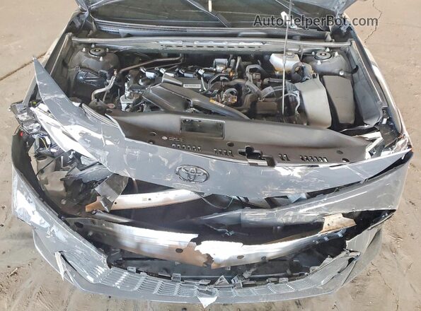 4T1DAACK1SU047823 2025 TOYOTA CAMRY Gray Vista interior trasera