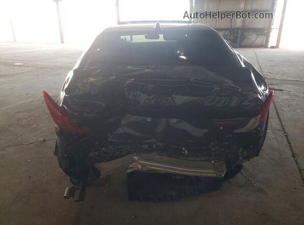4T1DAACK1SU047823 2025 TOYOTA CAMRY Gray Vista trasera