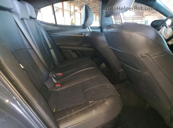 4T1DAACK1SU047823 2025 TOYOTA CAMRY Gray Vista de los asientos traseros