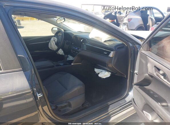 4T1DAACK1SU109527 2025 TOYOTA CAMRY Gray Вид салону спереду
