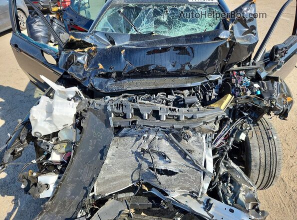 4T1DAACK1SU151342 2025 TOYOTA CAMRY Black Սալոնի հետևի տեսք