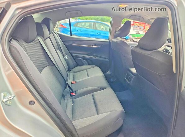 4T1DAACK1SU156993 2025 TOYOTA CAMRY Silver Rear seats view