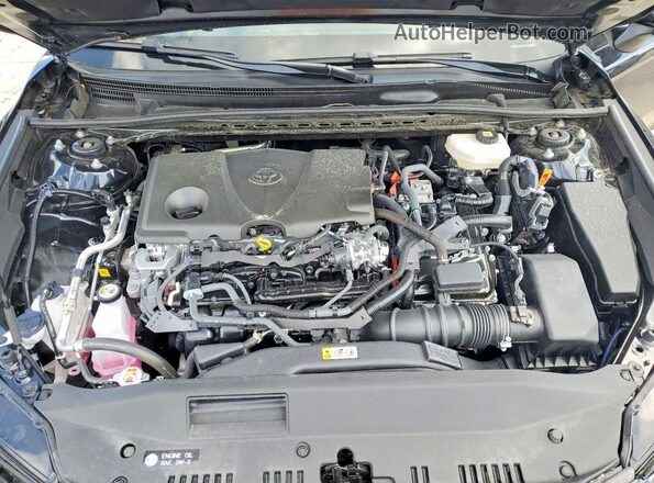 4T1DAACK1SU607355 2025 TOYOTA CAMRY Black Rear interior view