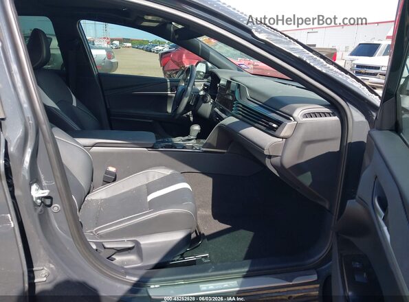4T1DAACK2SU076912 2025 TOYOTA CAMRY Серый Вид салона спереди