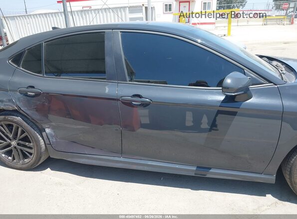 4T1DAACK2SU176704 2025 TOYOTA CAMRY Gray Սալոնի հետևի տեսք