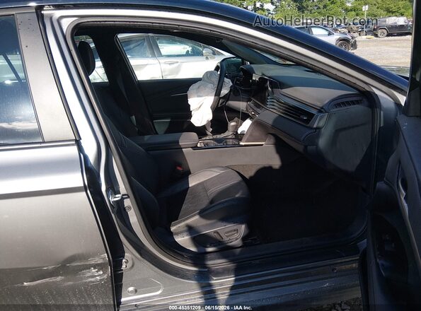 4T1DAACK3SU529886 2025 TOYOTA CAMRY Серый Вид салона спереди