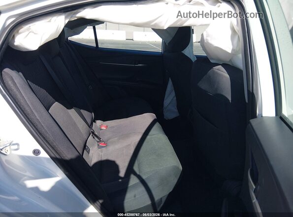 4T1DAACK4SU037772 2025 TOYOTA CAMRY White Vista de la etiqueta del VIN