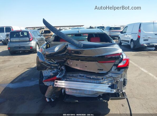 4T1DAACK4SU600514 2025 TOYOTA CAMRY Серый Вид спереди