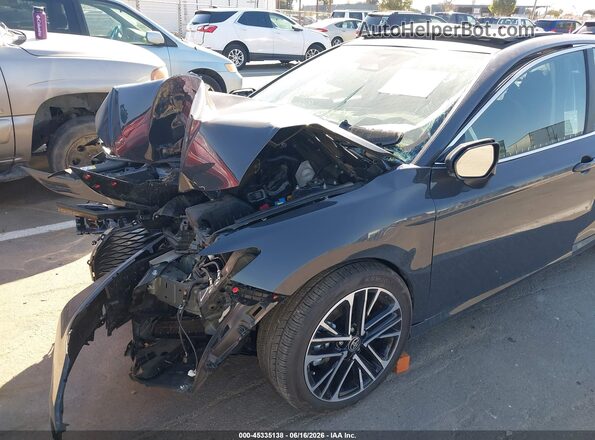 4T1DAACK5SU134964 2025 TOYOTA CAMRY Gray Սալոնի հետևի տեսք