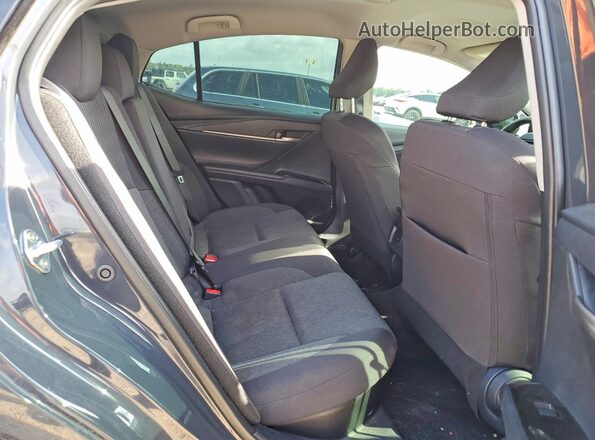 4T1DAACK5SU570908 2025 TOYOTA CAMRY Gray Widok tylnych siedzeń