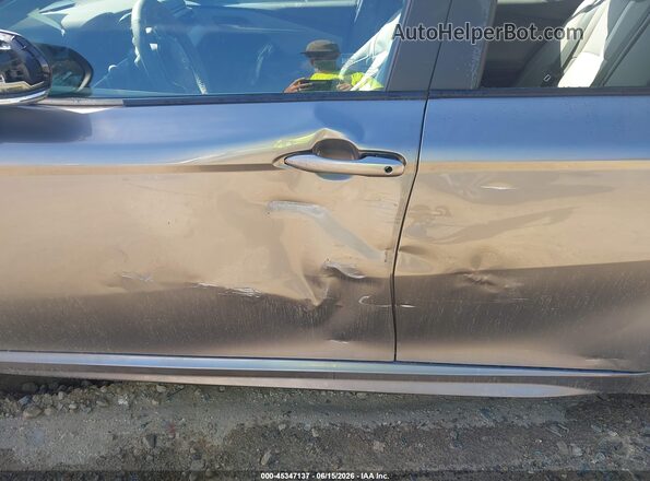 4T1DAACK5SU646384 2025 TOYOTA CAMRY Gray 
