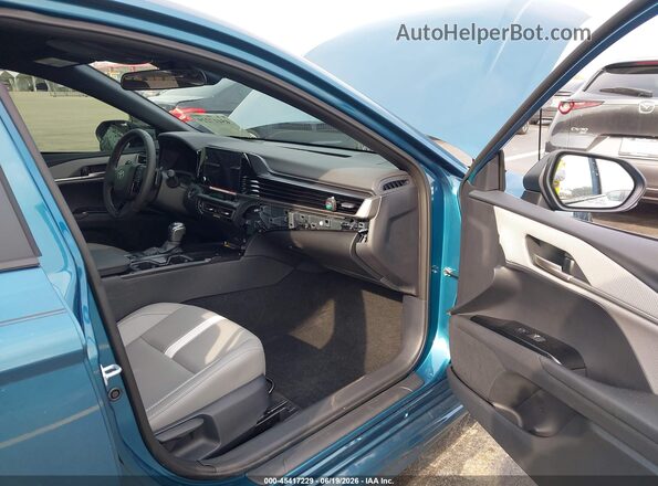 4T1DAACK5TU747328 2026 TOYOTA CAMRY Turquoise Вид салону спереду
