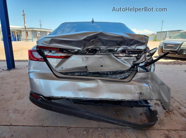 4T1DAACK6SU056694 2025 TOYOTA CAMRY Silver Rear view