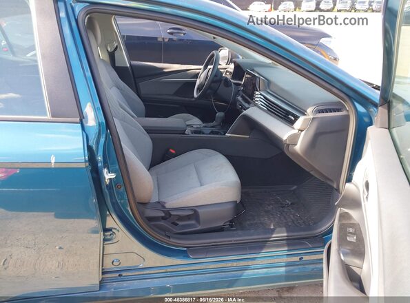 4T1DAACK8SU640143 2025 TOYOTA CAMRY Бирюзовый Вид салона спереди
