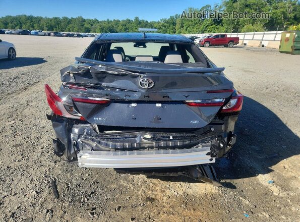 4T1DAACK8TU281099 2026 TOYOTA CAMRY Gray Vista trasera