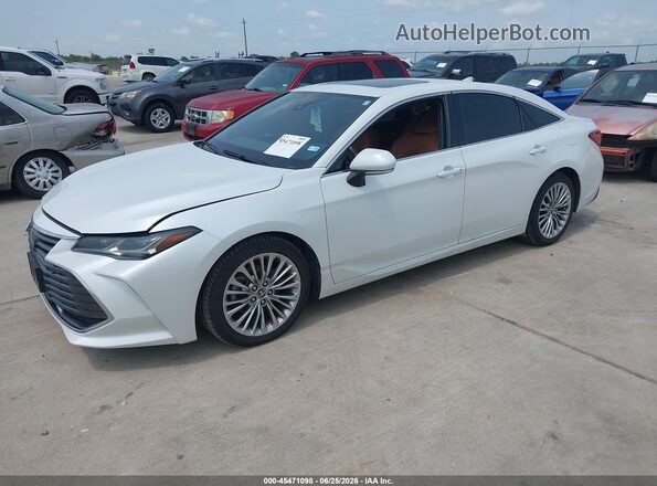 4T1DZ1FB6MU058453 2021 TOYOTA AVALON White Vista tres cuartos delantera izquierda