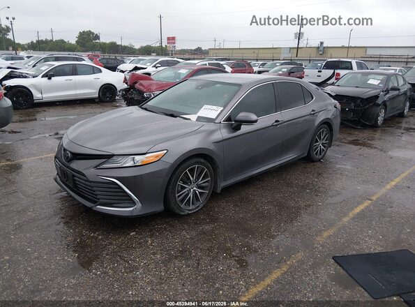 4T1F11AK1NU076447 2022 TOYOTA CAMRY Gray Vista tres cuartos delantera izquierda