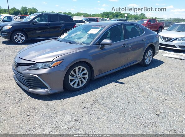 4T1R11AK9MU597623 2021 TOYOTA CAMRY Gray Vista tres cuartos delantera izquierda