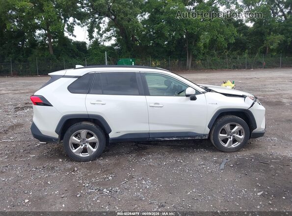 4T3B6RFV2MU044615 2021 TOYOTA RAV4 HYBRID White Vista interior trasera