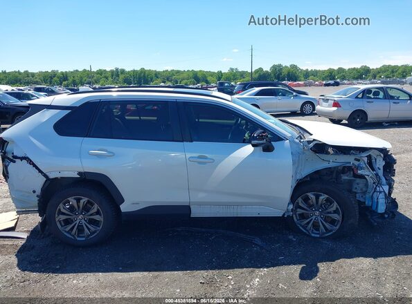 4T3B6RFV5PU107890 2023 TOYOTA RAV4 HYBRID White Rear interior view