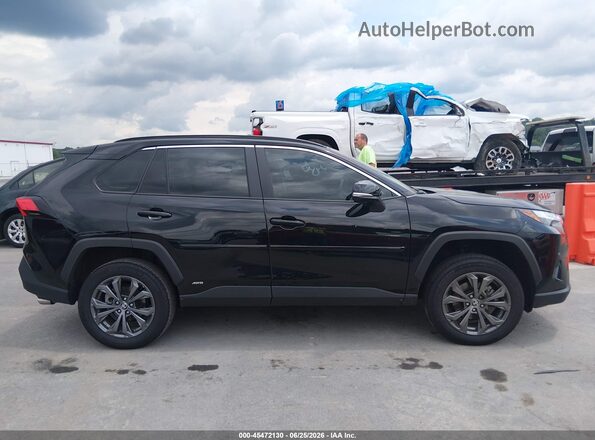 4T3B6RFV6NU103165 2022 TOYOTA RAV4 HYBRID Black Вид задньої частини салону