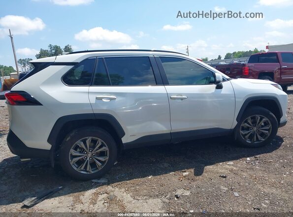 4T3B6RFV7RU171805 2024 TOYOTA RAV4 HYBRID White Вид задньої частини салону