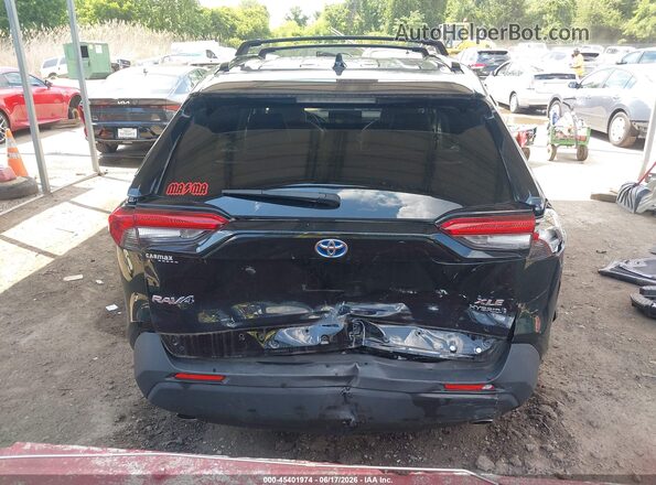 4T3B6RFV9MU019355 2021 TOYOTA RAV4 HYBRID Black 