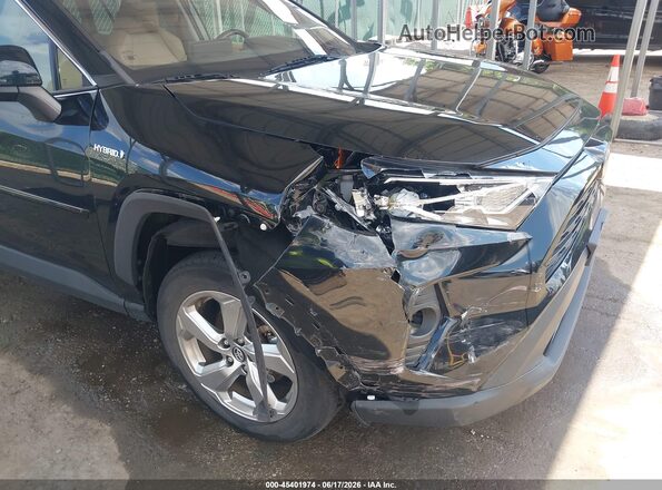 4T3B6RFV9MU019355 2021 TOYOTA RAV4 HYBRID Black Front view