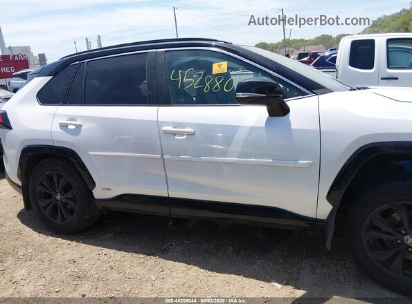 4T3E6RFV0PU107177 2023 TOYOTA RAV4 HYBRID Белый Вид задней части салона