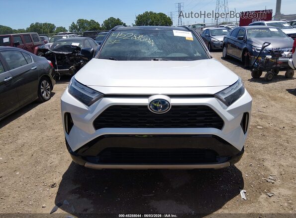 4T3E6RFV0PU107177 2023 TOYOTA RAV4 HYBRID Белый Вид щитка приборов