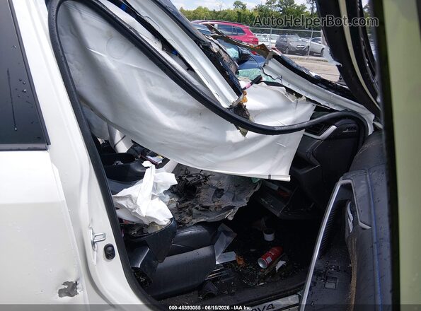 4T3E6RFV2MU051660 2021 TOYOTA RAV4 HYBRID White Front interior view