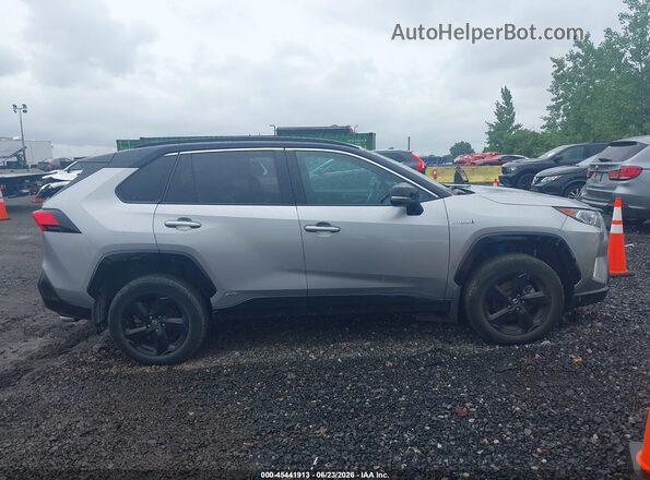 4T3E6RFV2MU054722 2021 TOYOTA RAV4 HYBRID Gray Widok wnętrza z tyłu