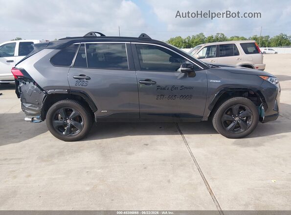 4T3E6RFV3MU034253 2021 TOYOTA RAV4 HYBRID Gray Rear interior view
