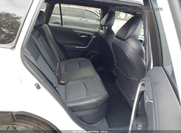 4T3E6RFV8PU130125 2023 TOYOTA RAV4 HYBRID White Vista de la etiqueta del VIN
