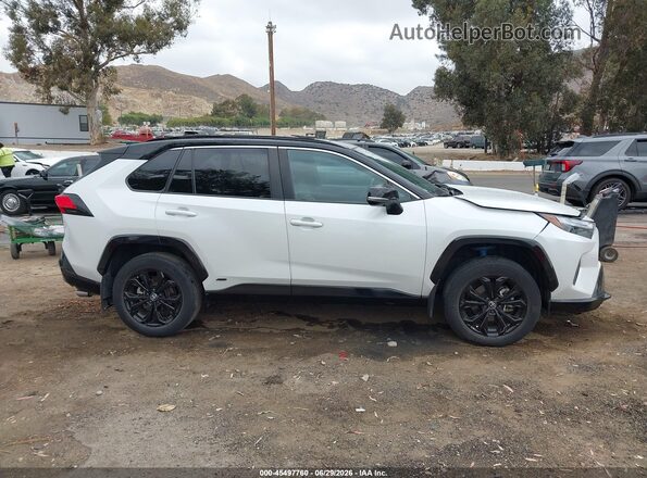 4T3E6RFV8PU130125 2023 TOYOTA RAV4 HYBRID White Vista interior trasera